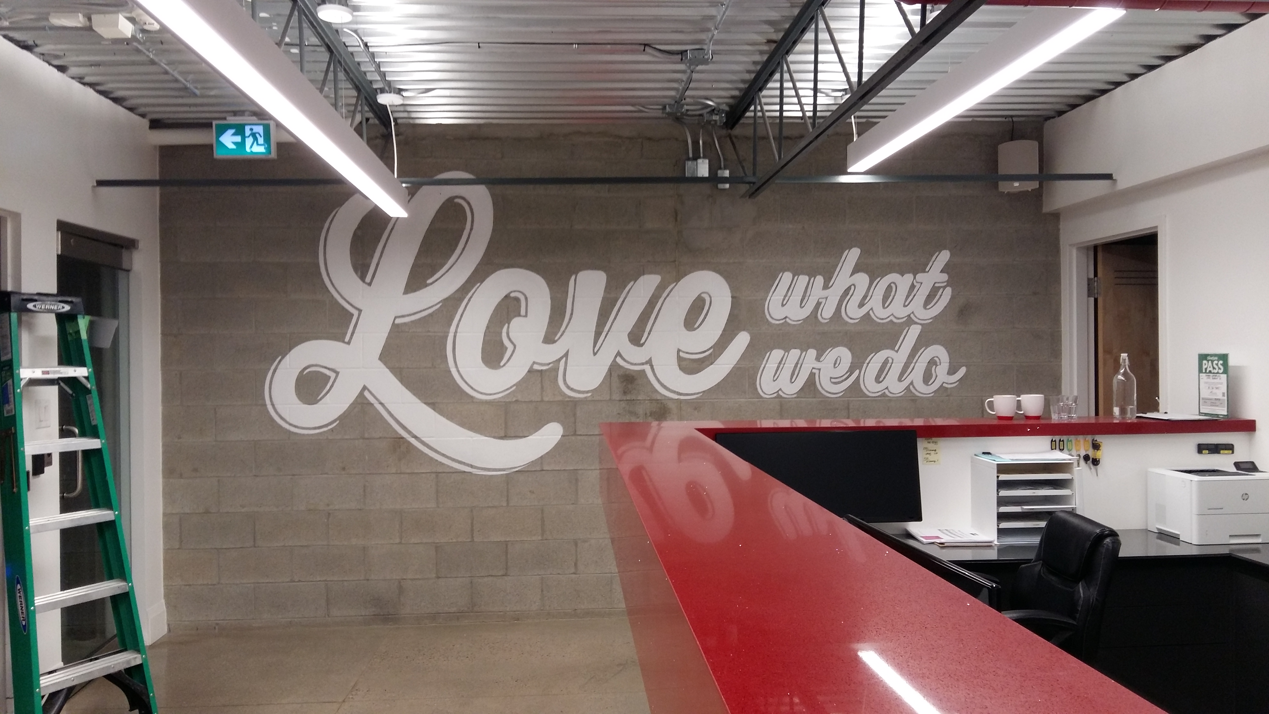 Painted lettering on wall