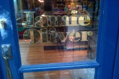 Gilded logo with gold painted outline at Jamie's Italian, Greenwich, London, 2014