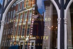 Gilded lettering at Fenman & Goddard, Savile Row, London, 2014