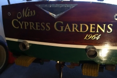 Gold Leaf lettering hand painted with dark green shadow to match existing waterline colour. Toronto 2018
