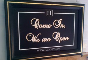 hand painted sign with gold leaf shadow & line border